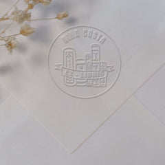 Sello en seco para libros banderola ex libris