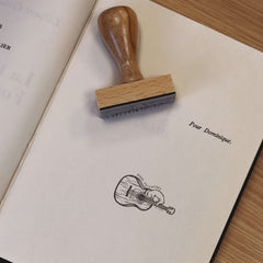 Sello gato guitarra