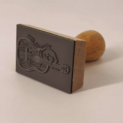 Sello gato guitarra