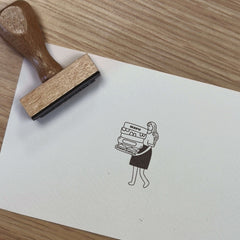 Sello ex libris mujer llevando libros