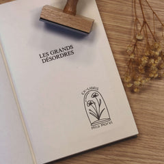 Sello ex libris flores bajo vidrio