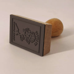 Sello ex libris rosa enmarcada