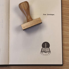 Sello ex libris libro y vela