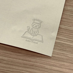 Ex libris gato sobre libro